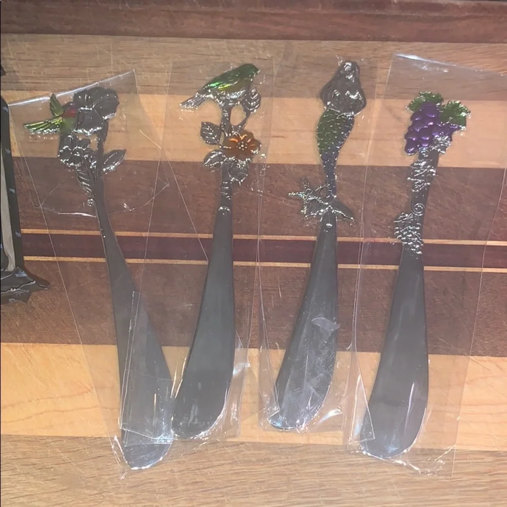 Four decorative GANZ cheese spreaders mermaid birds grapes